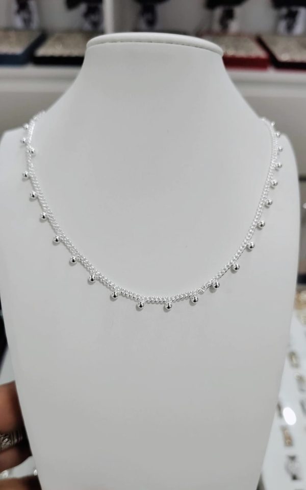 Collar grumme con bolitas