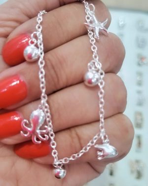 Pulsera con dijes marinos