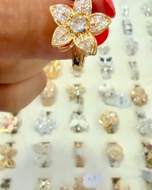 Anillo flor giratorio dorado