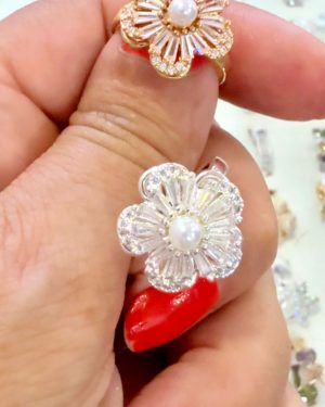 Anillo flor Candida giratorio