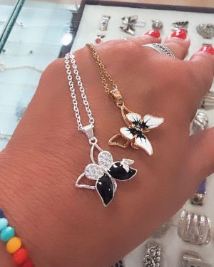 Collar mariposa giratorio