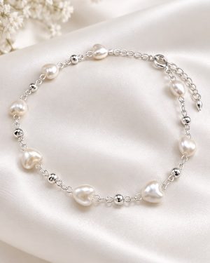 Pulsera corazon perla...........Adelanto